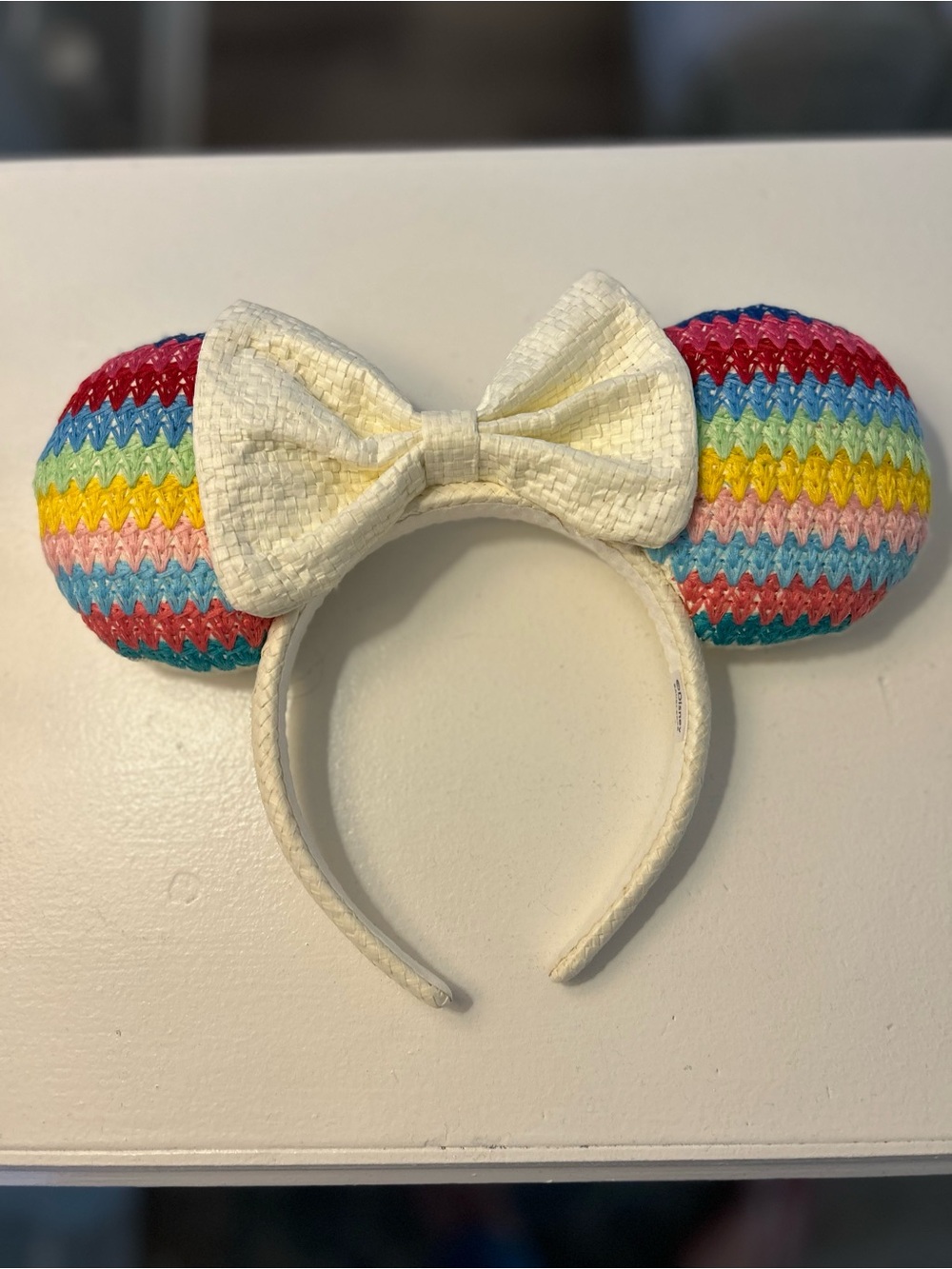 BaubleBar Rainbow Ear Headband with Cream Bow